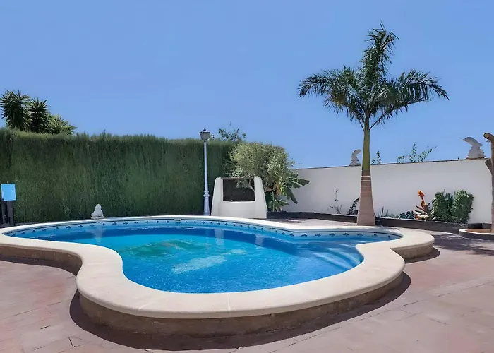 Дом отдыха Casa El Pilaito Con Piscina Compartida Cerca De La Playa